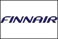 Winst Finnair ruimschoots gehalveerd