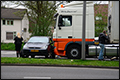 Flinke schade na aanrijding met vrachtwagen in Rotterdam [+foto]