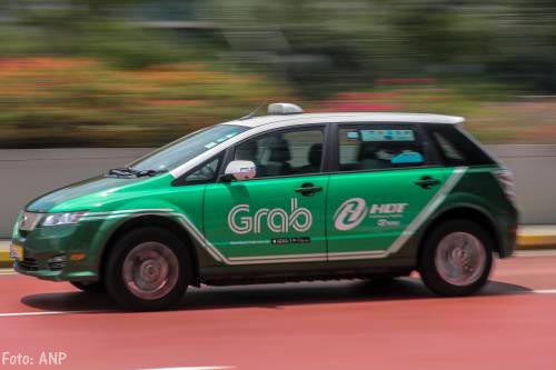 Singapore straft Uber en Grab